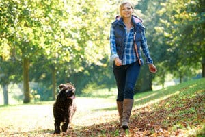 woman walking her dog