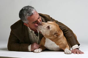 Cesar with his Pit Bull, Daddy.
