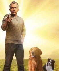 Cesar Millan with two dogs