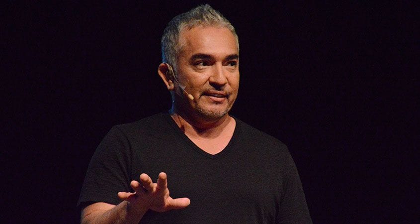 Cesar Millan speaks to a crowd.